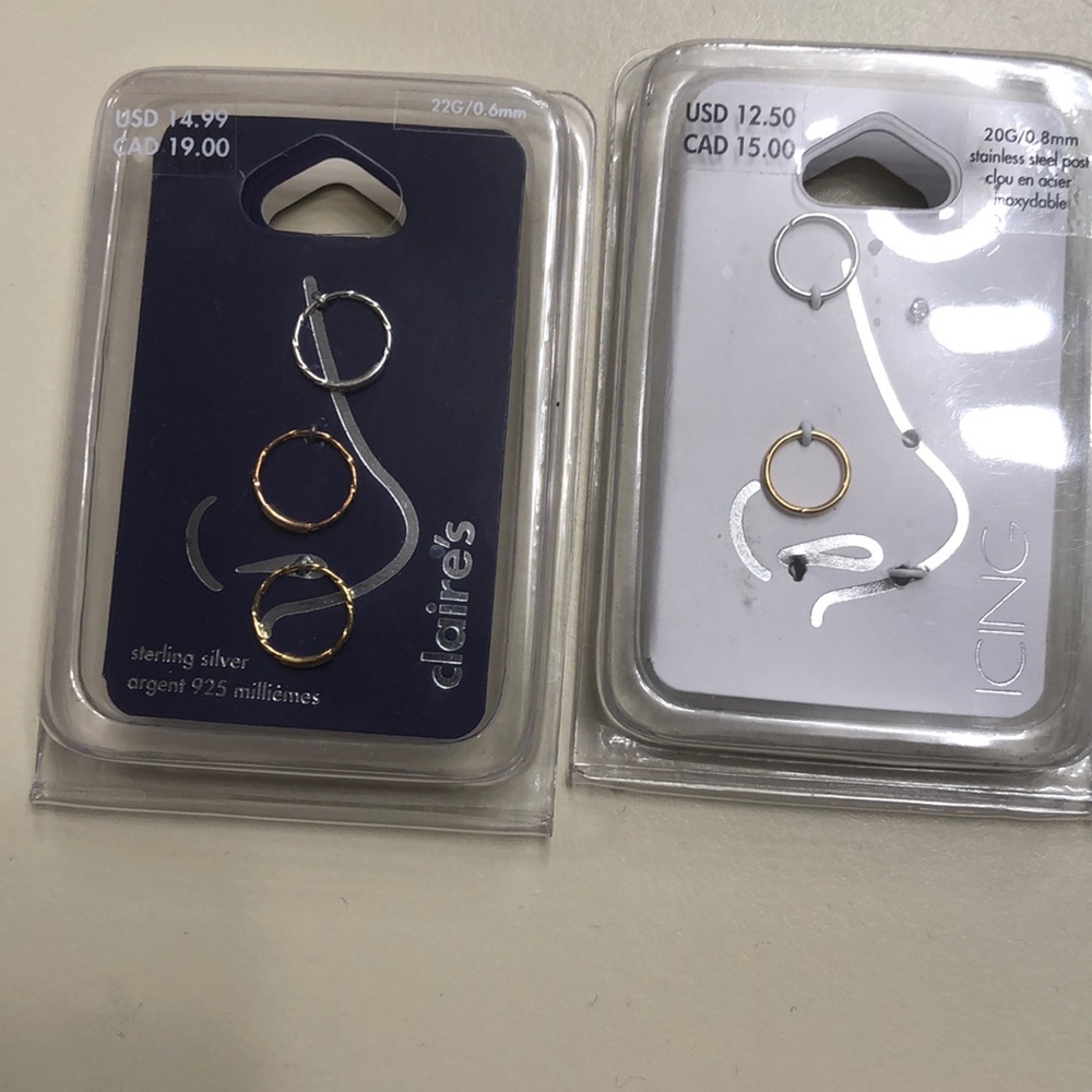 5 nose rings hoops and 1 nose stud